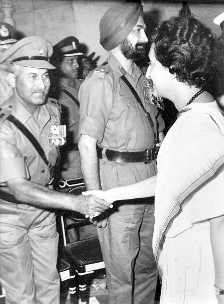 Shaking hands with Indira Gandhi
